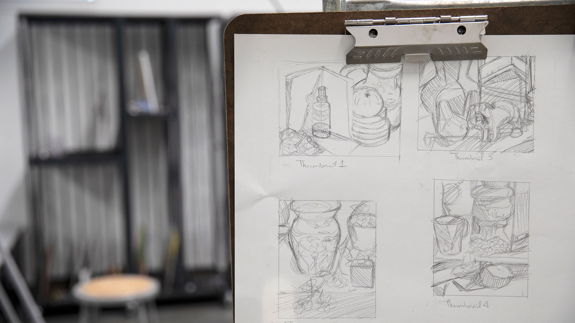 Pencil drawing hanging on an artboard