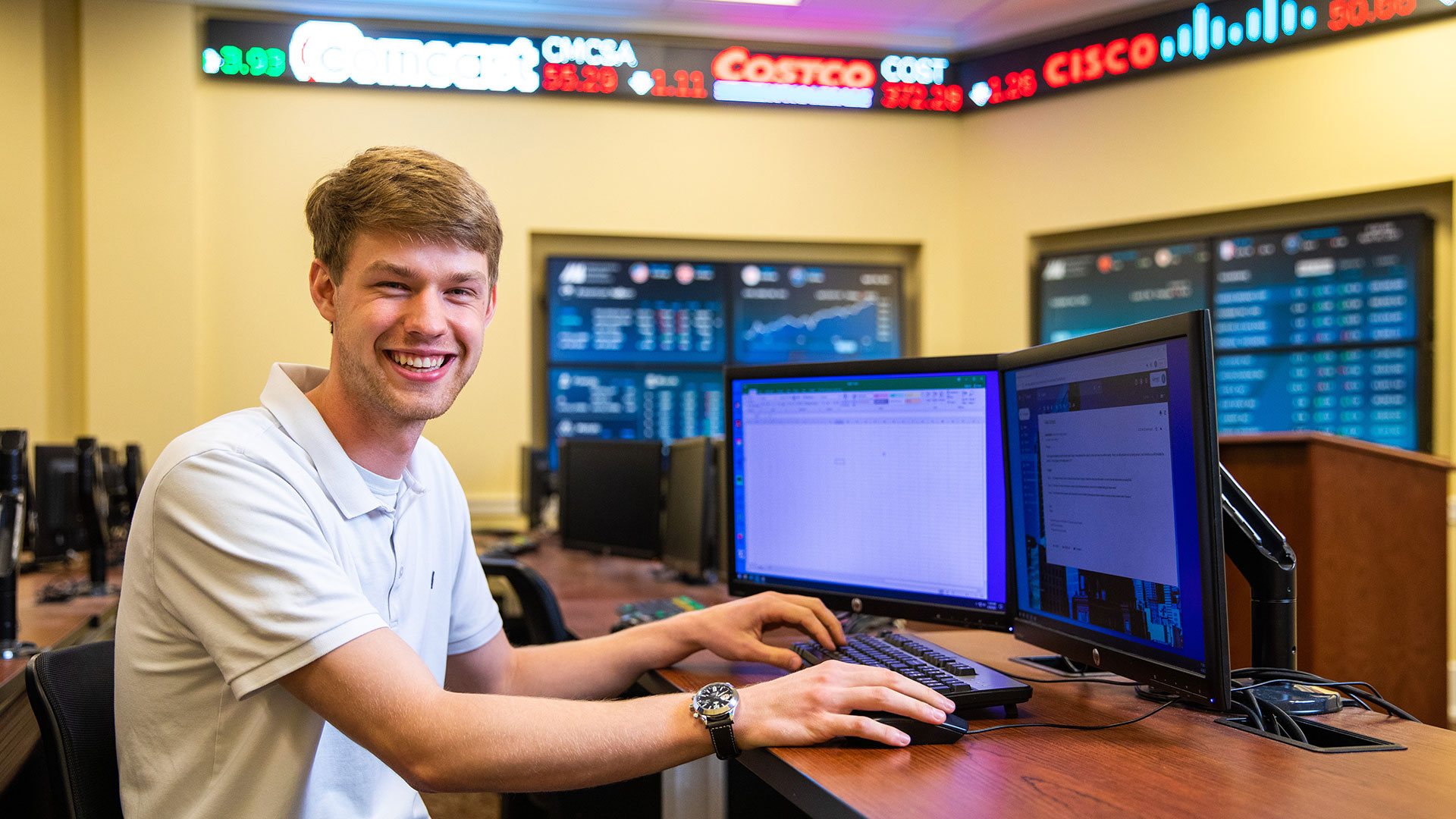 Student at a computer in the Luter School trading room