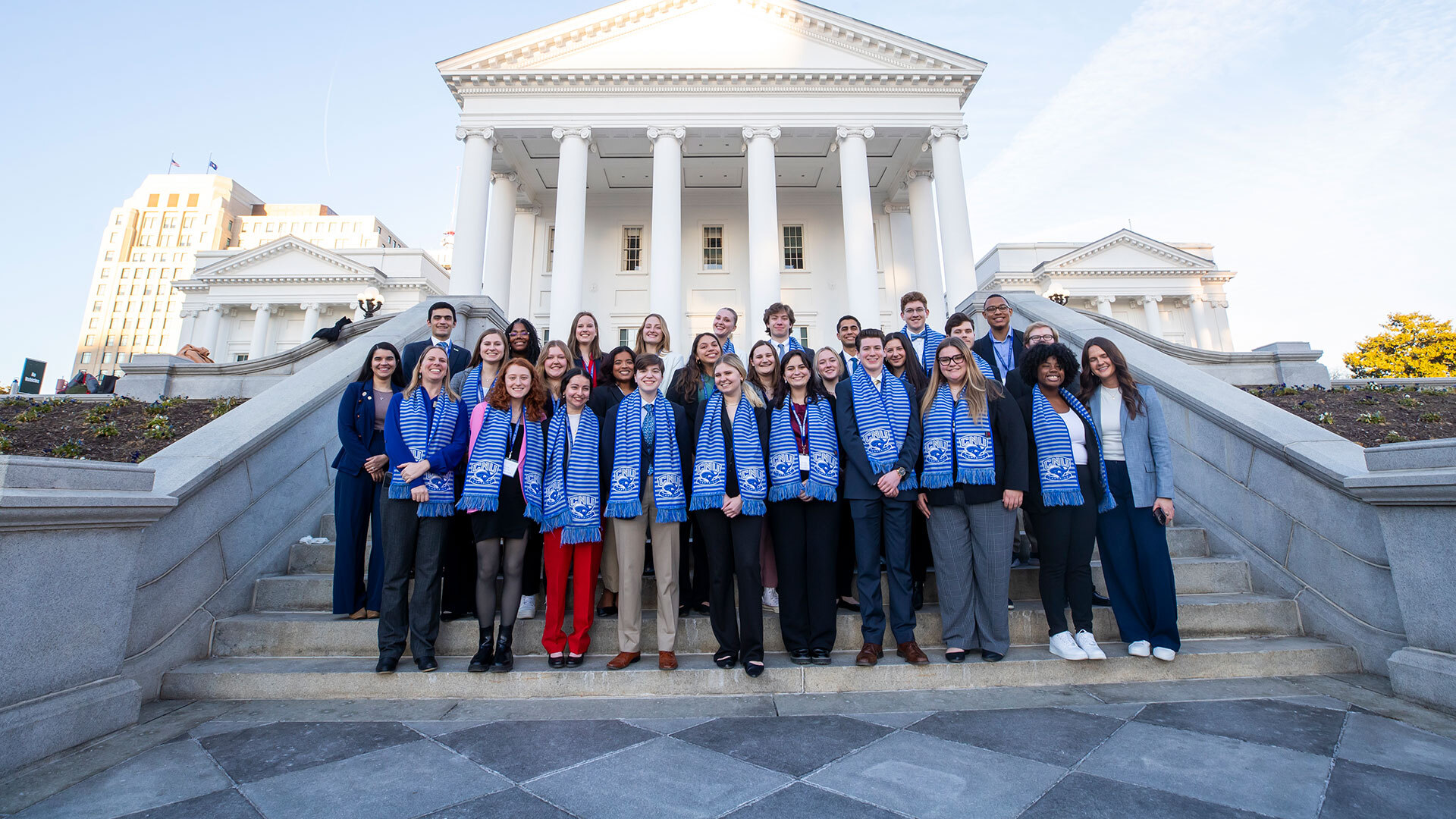 Christopher Newport University students pose for a photo outside the Virginia State Capitol in Richmond for the annual Captains in the Capital event.
