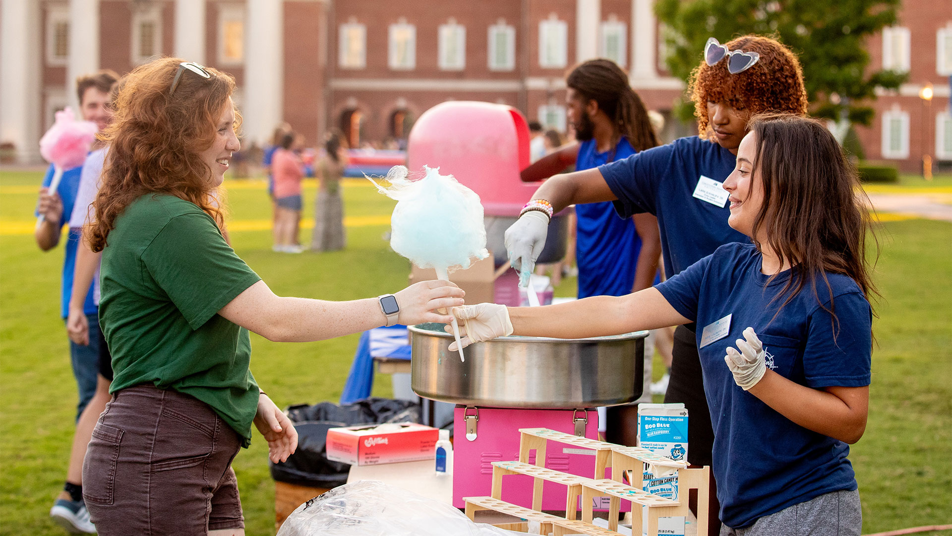 Students pass out concessions at CNU's student block party.